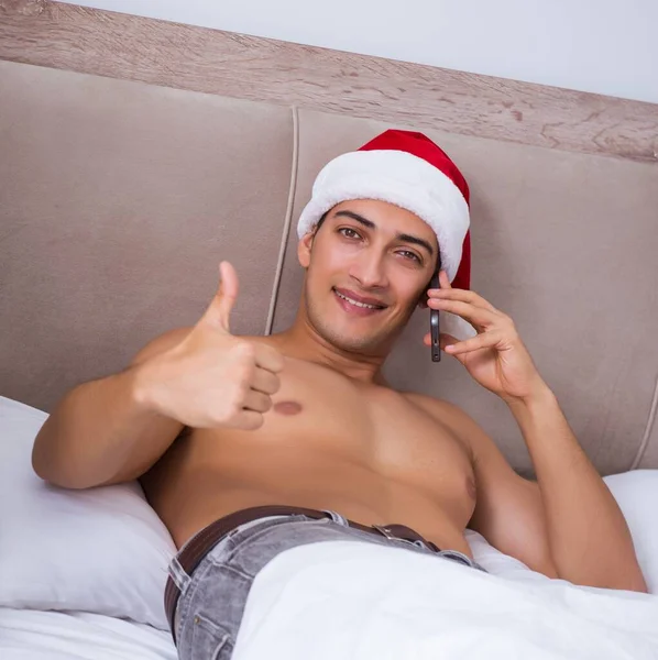 Sexy Man Bed Wearing Santa Hat Christmas Concept — Stock Photo, Image