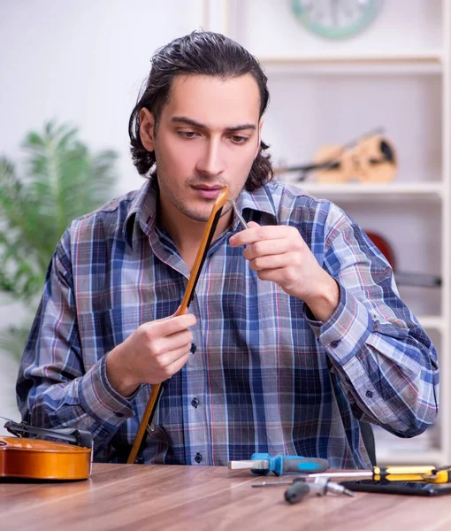 Young Handsome Repairman Repairing Violin — Stock Photo, Image