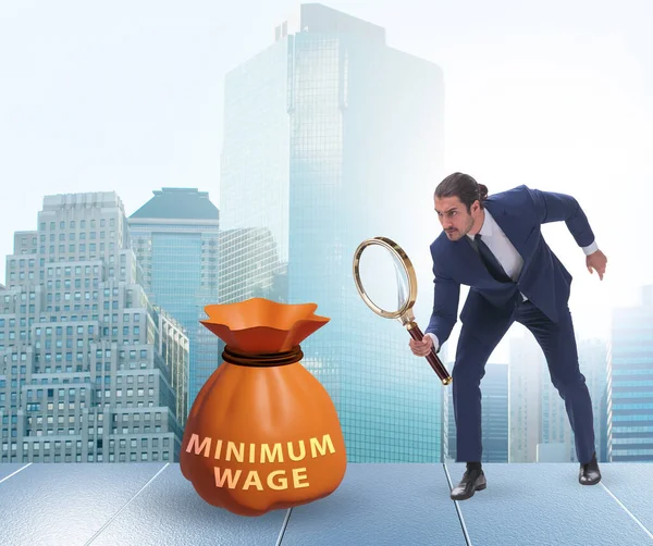 Stock image The concept of minimum wage with businessman