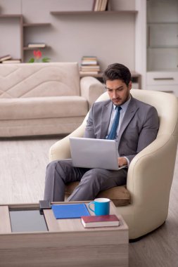 Young employee working from home during pandemic