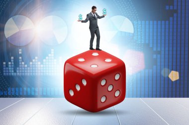 Businessman in uncertainty concept with the dice