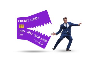 Businessman in the credit card debt concept