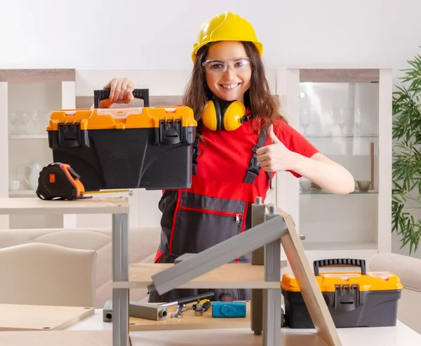 Female Contractor Repairing Furniture Home — 스톡 사진