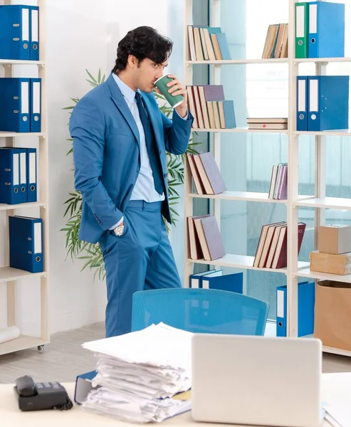 Young Handsome Male Employee Too Much Work Office — Foto de Stock