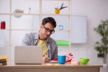 Young freelancer working from home during pandemic clipart