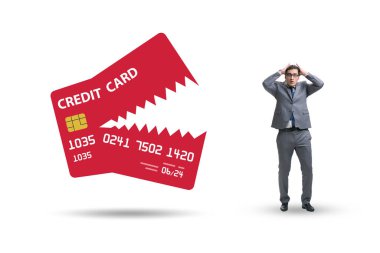 Businessman in the credit card debt concept