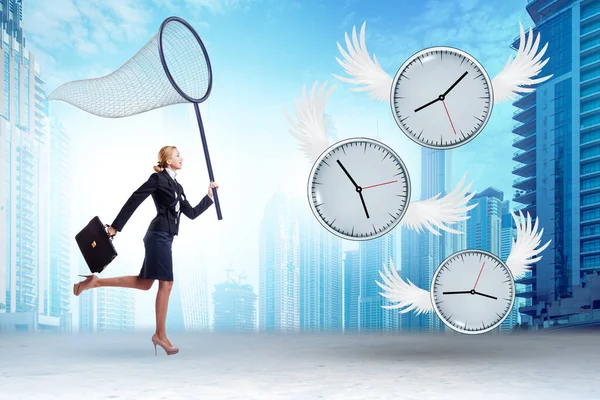 Deadline Concept Businesswoman Catching Clocks — Stock Photo, Image