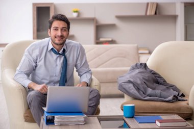 Young employee working from home during pandemic