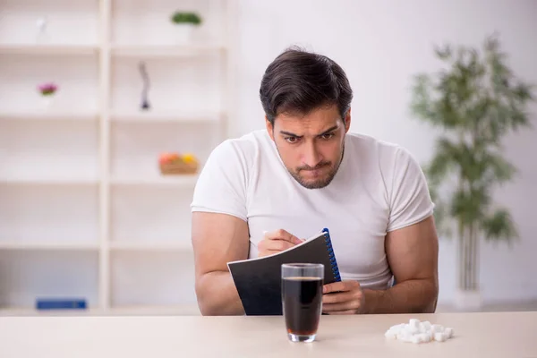 stock image Young student testing soft drink