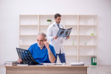 Two doctors radiologists working at the hospital