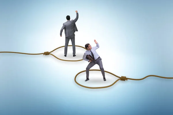 Business people trapped by the rope