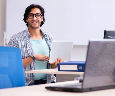 The it specialist working in the office