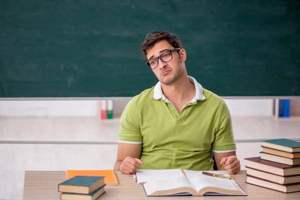 Young Student Sitting Classroom Front Blackboard — Stock Photo, Image
