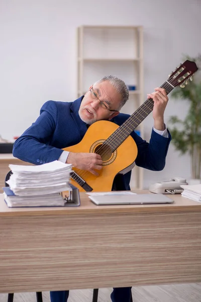 Old Employee Playing Guitar Office — Photo