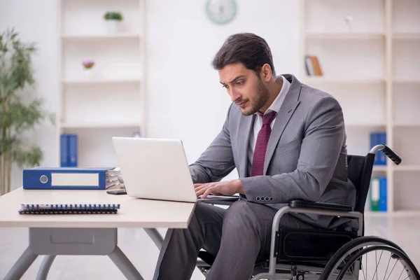 Young Male Employee Wheel Chair Working Workplace — 스톡 사진