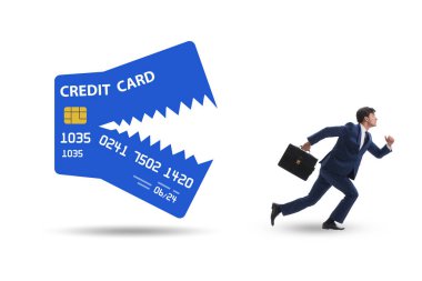 Businessman in the credit card debt concept
