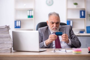 Old employee unhappy with excessive work at workplace