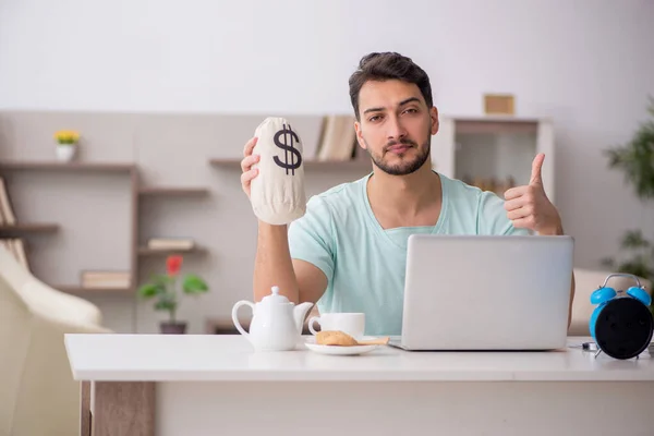 Young Freelancer Holding Moneybag Home — Stock Photo, Image