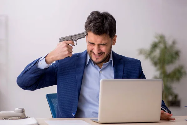 Young Employee Holding Gun Workplace — Stock Photo, Image