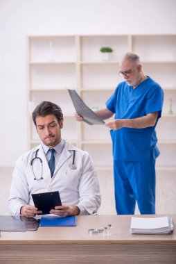 Two doctors radiologists working at the hospital