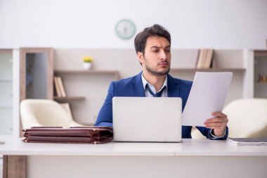 Young employee working from home during pandemic