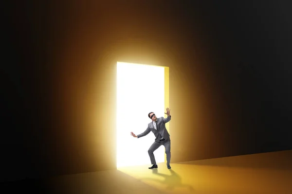 Businessman Entering Backlit Door Escape Concept — Stock Photo, Image