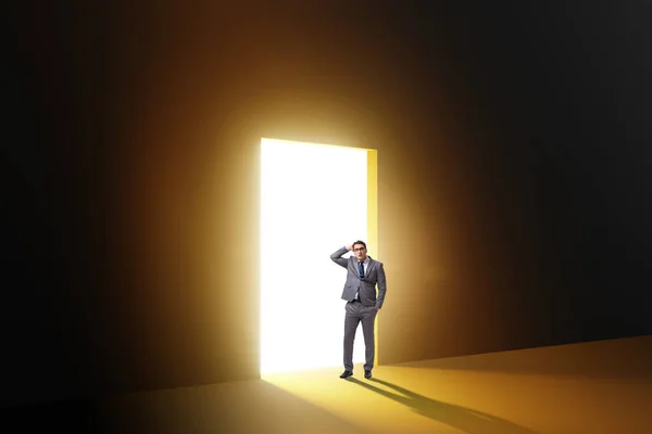 Businessman Entering Backlit Door Escape Concept — Stock Photo, Image