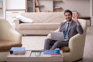 Young employee working from home during pandemic