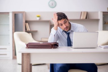 Young employee working from home during pandemic