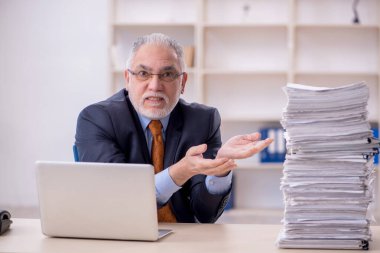 Old male employee and too much work at workplace