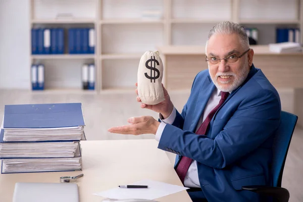 Old Employee Holding Money Bag — Stock Photo, Image