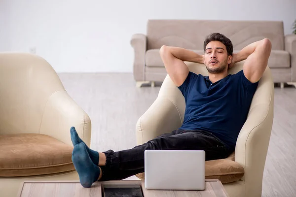 stock image Young freelancer working from home during pandemic