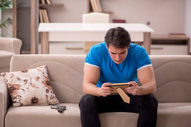 Young man in unreciprocated love concept