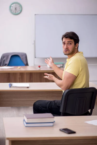 Young Student Teacher Sitting Classroom — Fotografia de Stock