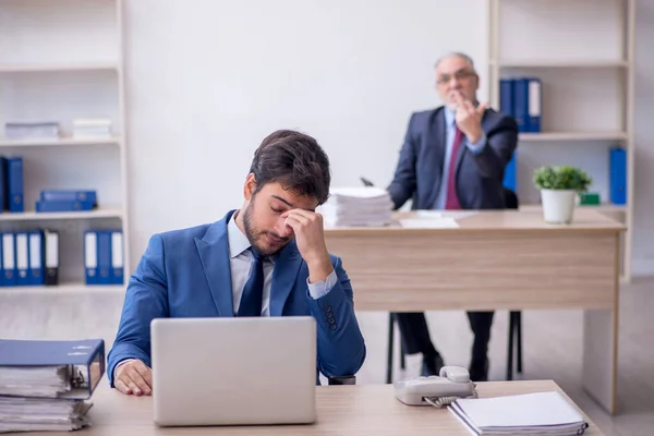 stock image Two colleagues working at workplace