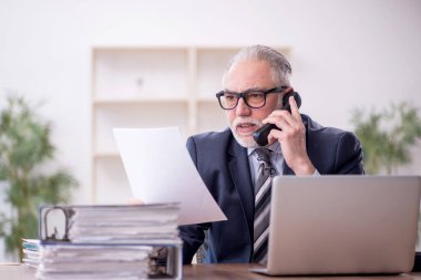 Old boss employee and too much work at workplace