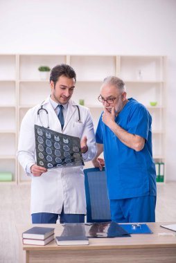 Two doctors radiologists working at the hospital