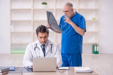 Two doctors radiologists working at the hospital