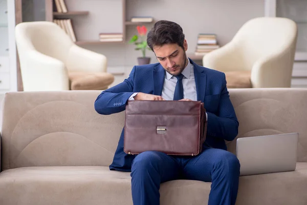 stock image Young businessman employee working from home during pandemic