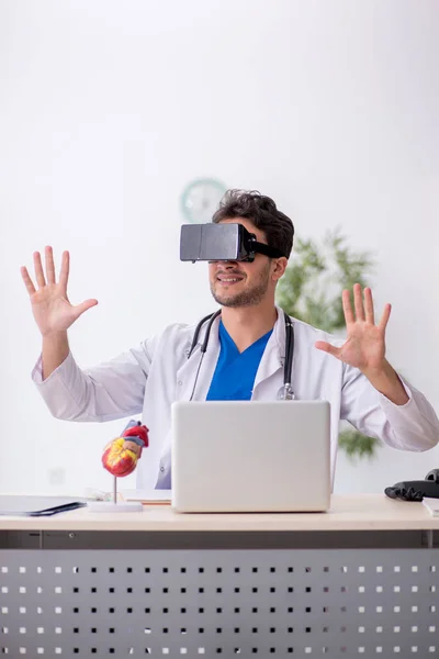 Young Doctor Enjoying Virtual Glasses Clinic — Stock Photo, Image