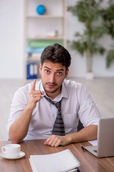 stock image Young employee working in the office