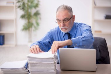 Old employee and too much work at workplace
