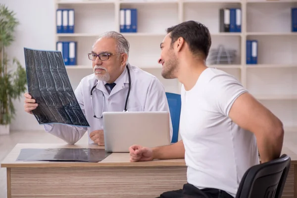 Young Patient Visiting Old Male Doctor Radiologist — Stock Photo, Image
