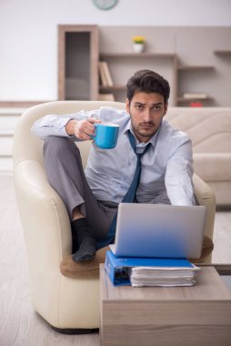 Young employee working from home during pandemic