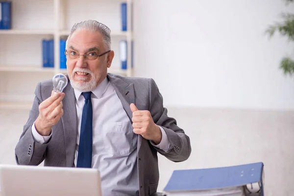 stock image Old employee in happy idea concept