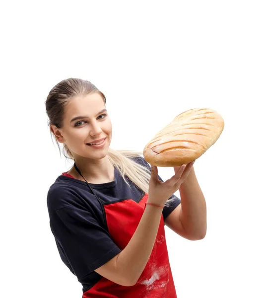 年轻的女面包师被隔离在白色的面包上 — 图库照片