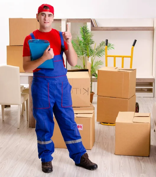 Der Junge Bauunternehmer Mit Boxen Die Drinnen Arbeiten — Stockfoto