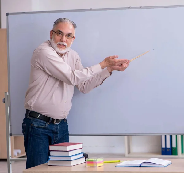 Senior Male Teacher Sitting Classroom — Stock Photo, Image