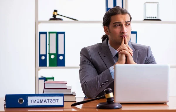 Young lawyer sitting in the office
