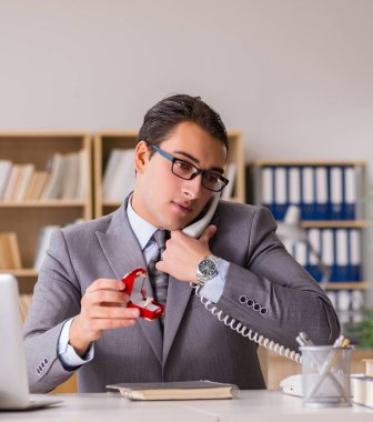 The man making proposal over phone